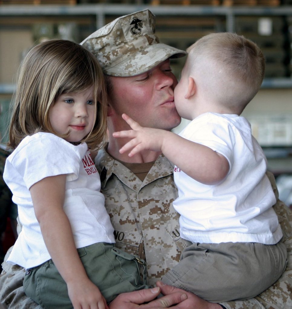 A soldier with his children